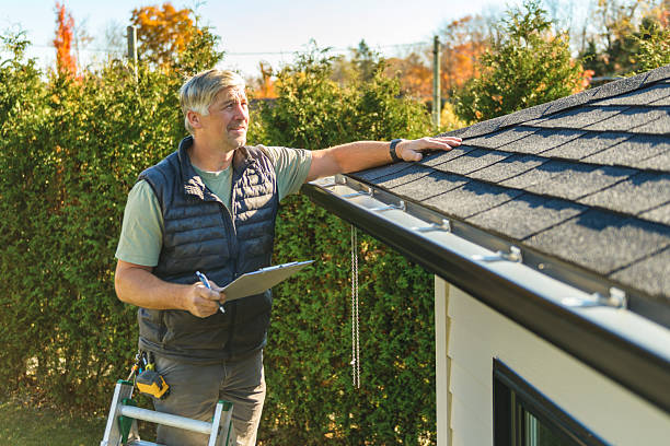 Professional Hail Damage Roof Repair technician working in University, MS